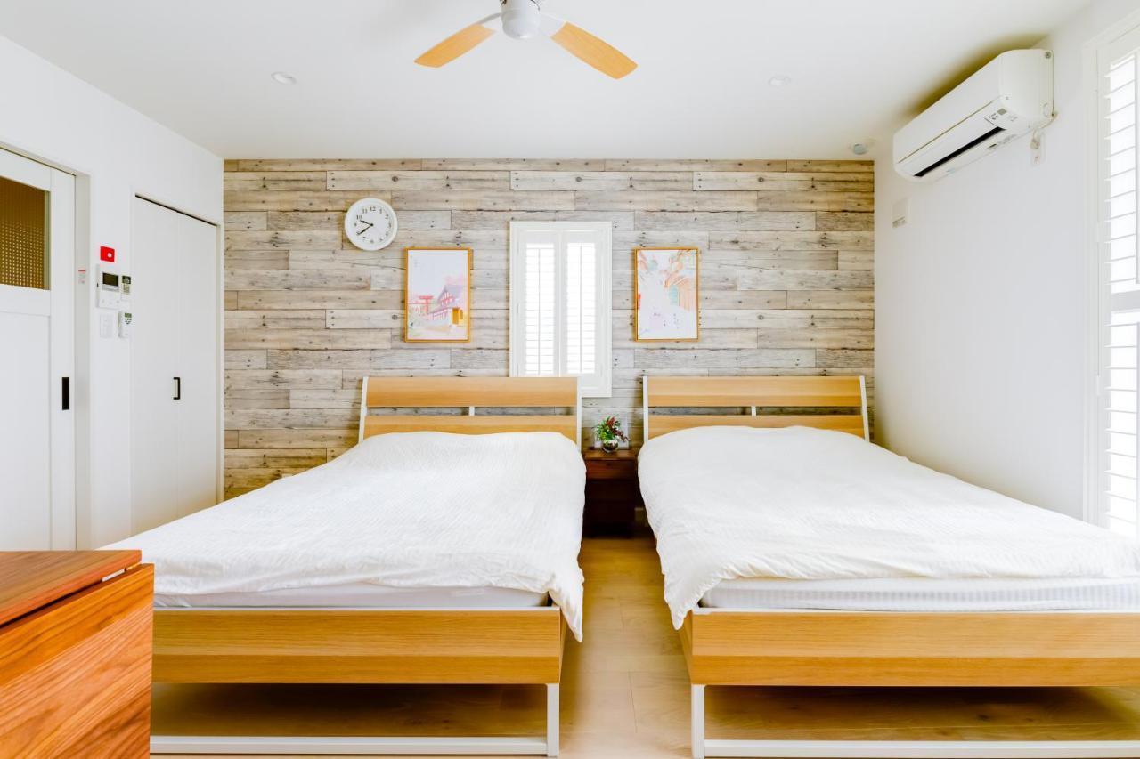 Ferienwohnung サンライズハワイ Ōsaka Exterior foto